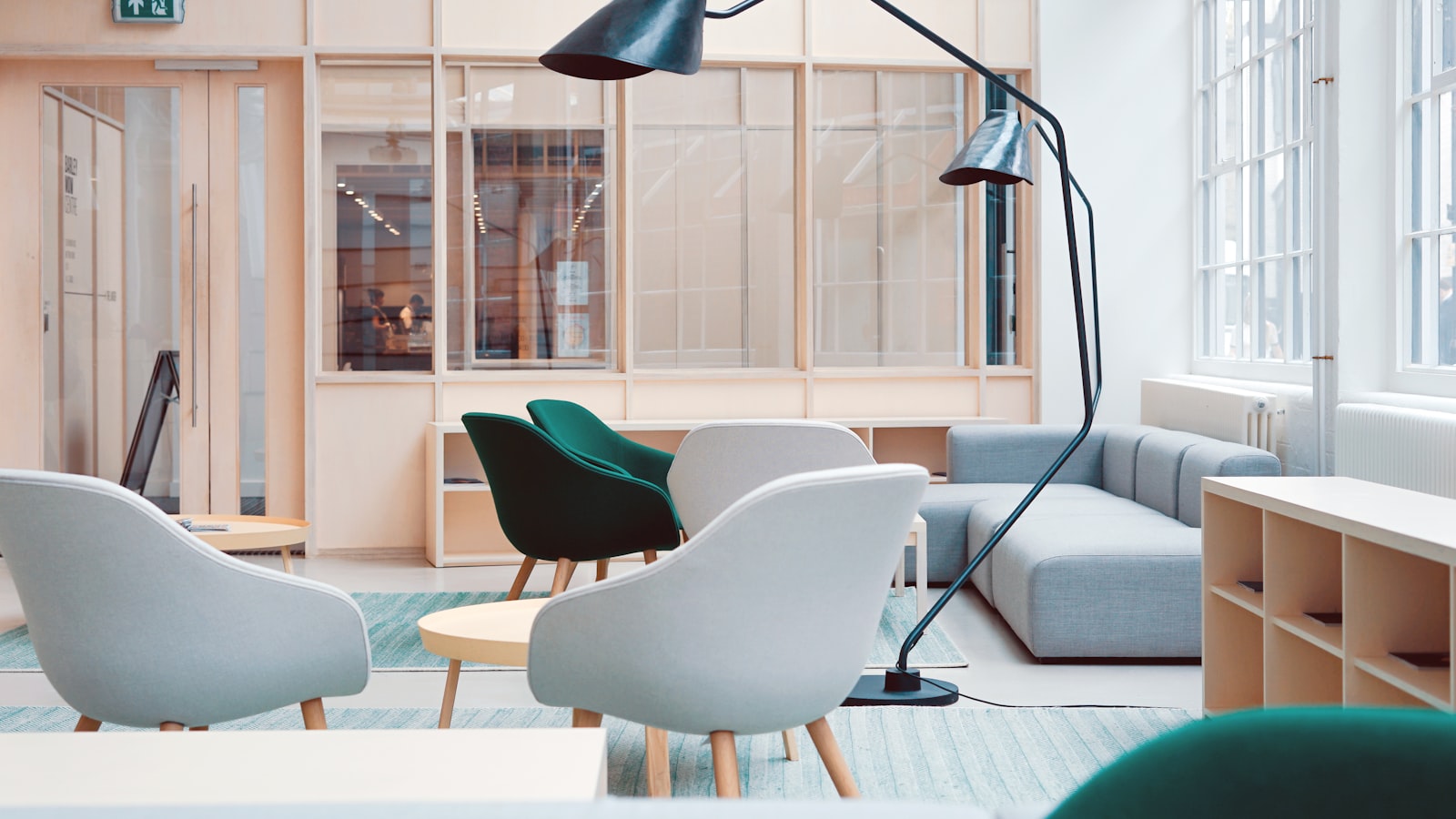 A tidy home office desk with a laptop, notebook, and clear workspace.