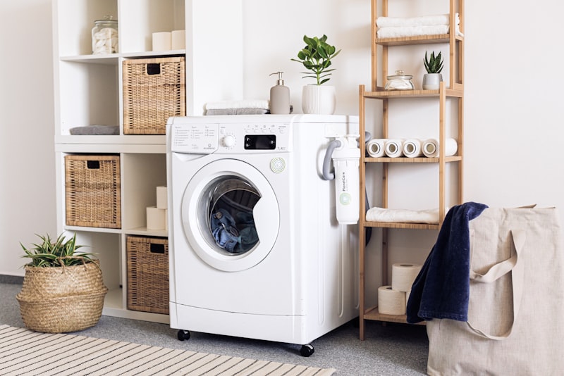 An organized laundry room with baskets, shelves, and neatly kept supplies.